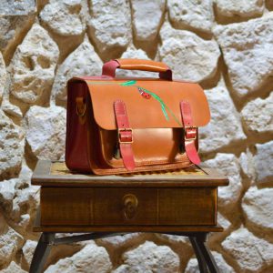 Bandolera de cuero tipo satchel con dibujo de mariquita en tienda online